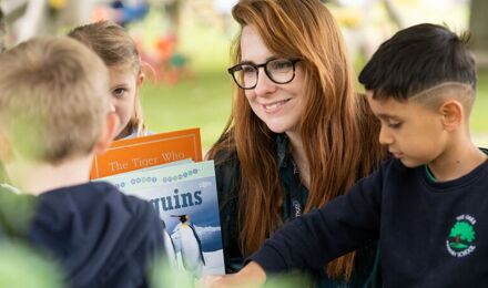 Teacher and students outside