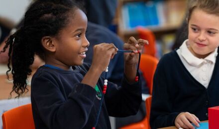 Students with beads 2