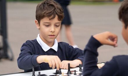 Students playing chess