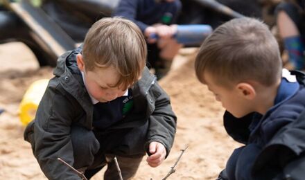 Students in sandpit