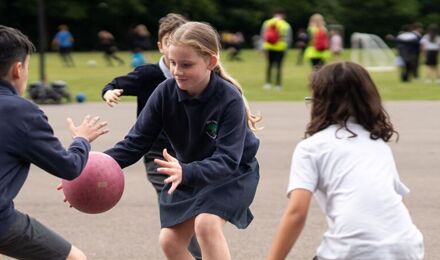 Students playing basketball